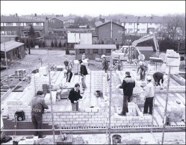 Dennis, Oz and Bomber along with their German co-workers during the opening scenes of Series 1, Episode 1 at Elstree Studio backlot doubling at the German BECO Building Site.
